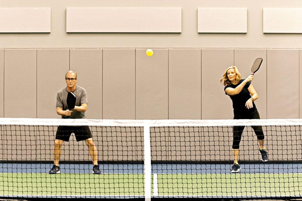 InPickleball | Cage Pickleball players